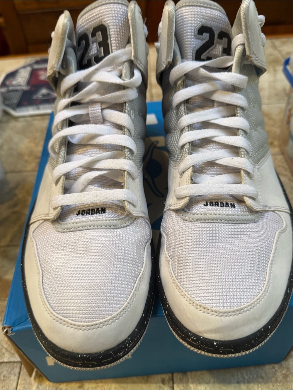 Jordan White and Silver High-Top Sneakers with Black Speckled Midsole